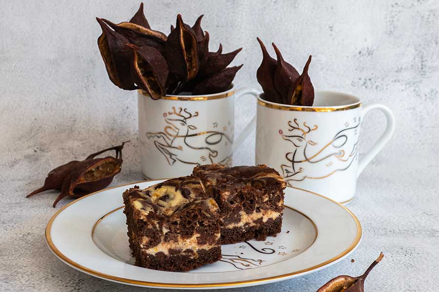 gluten free coffee brownie with ricotta swirl on a dessert plate