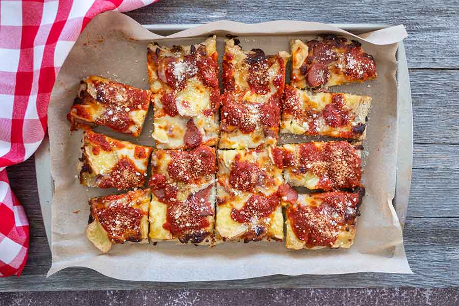 sliced Detroit style gluten free pizza