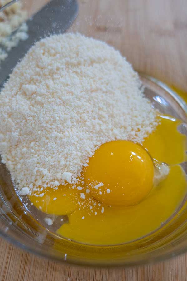 eggs and pecorino Romano cheese in a bowl