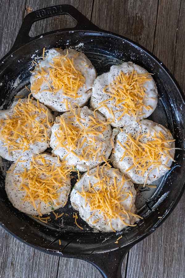 unbaked mashed potato biscuits in a skillet