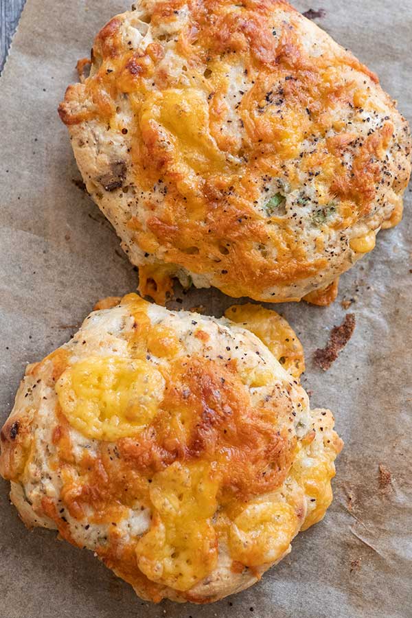 baked mashed potato biscuits on a baking sheet