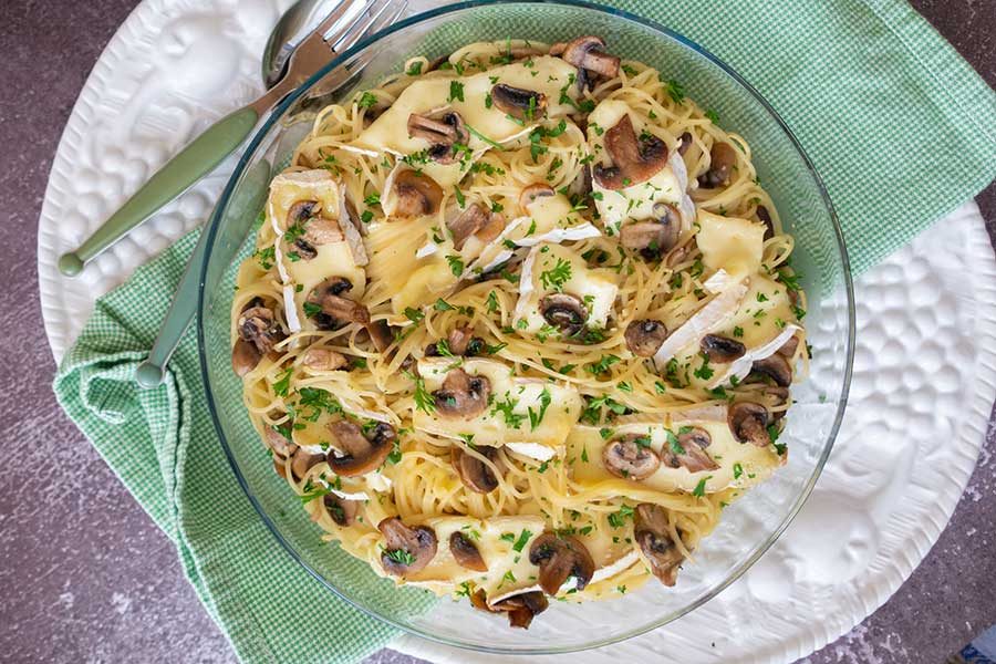 gluten-free mushroom carbonara with brie on a plate
