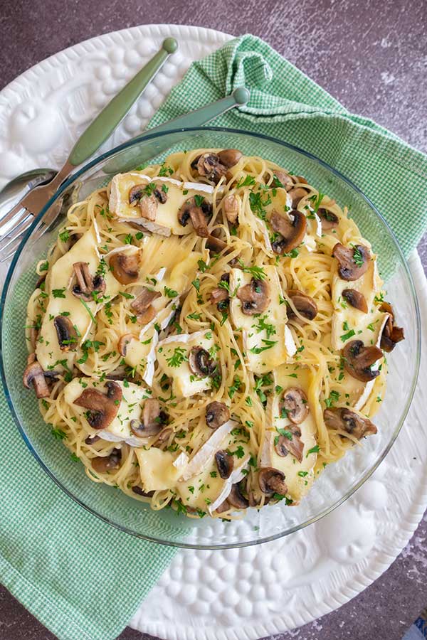 gluten-free mushroom carbonara with brie on a plate