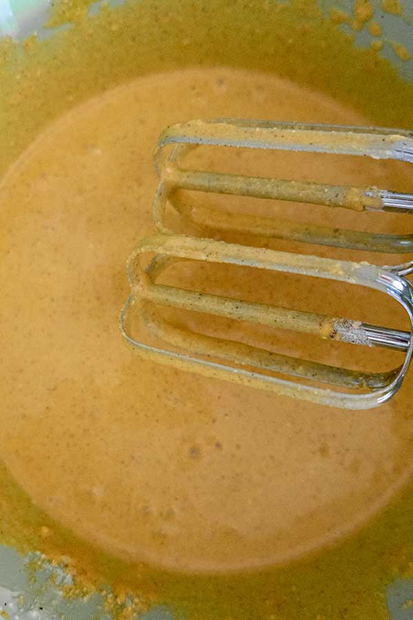 pumpkin cheesecake batter in a bowl