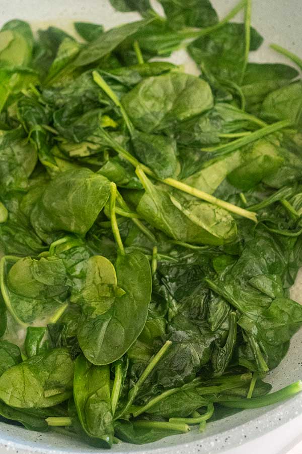 sauteed spinach in a skillet