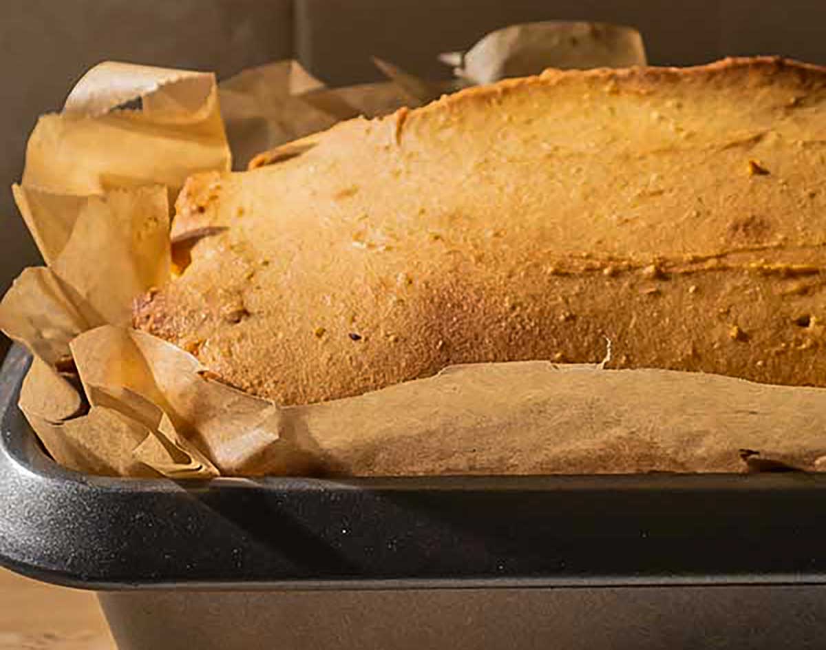 freshly baked lemon lemon loaf in a pan