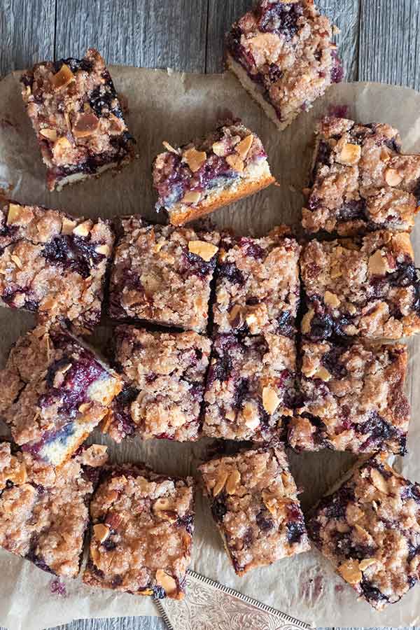 sliced gluten free blueberry coffee cake into squares