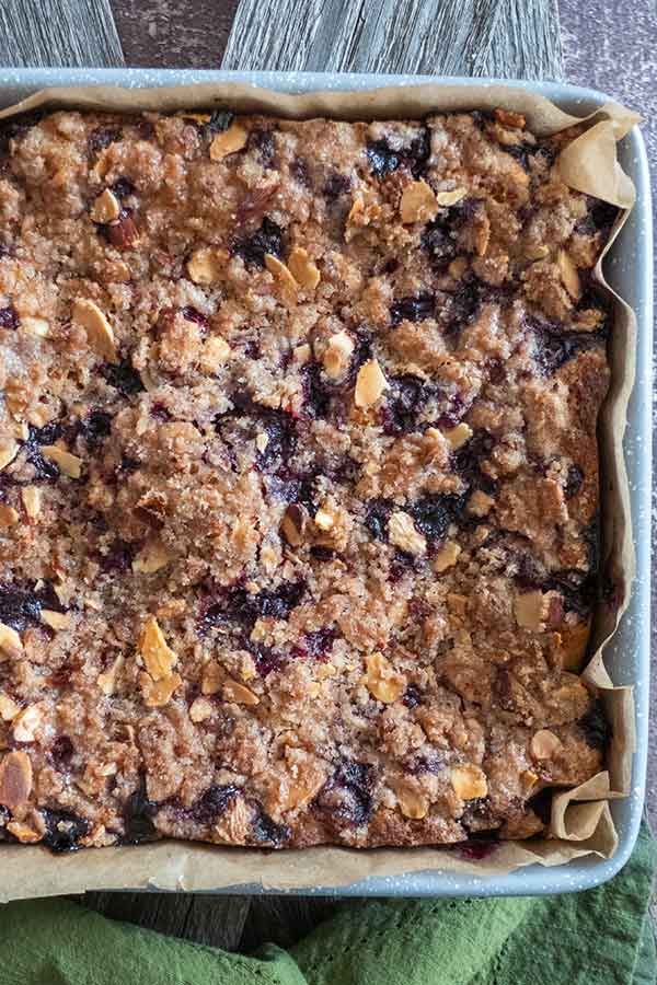 baked gluten free blueberry streusel cake in a square pan