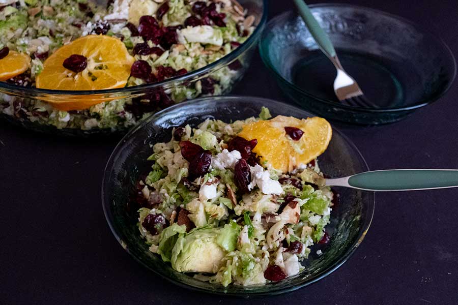 brussel sprout vegetarian salad with cranberries in a bowl