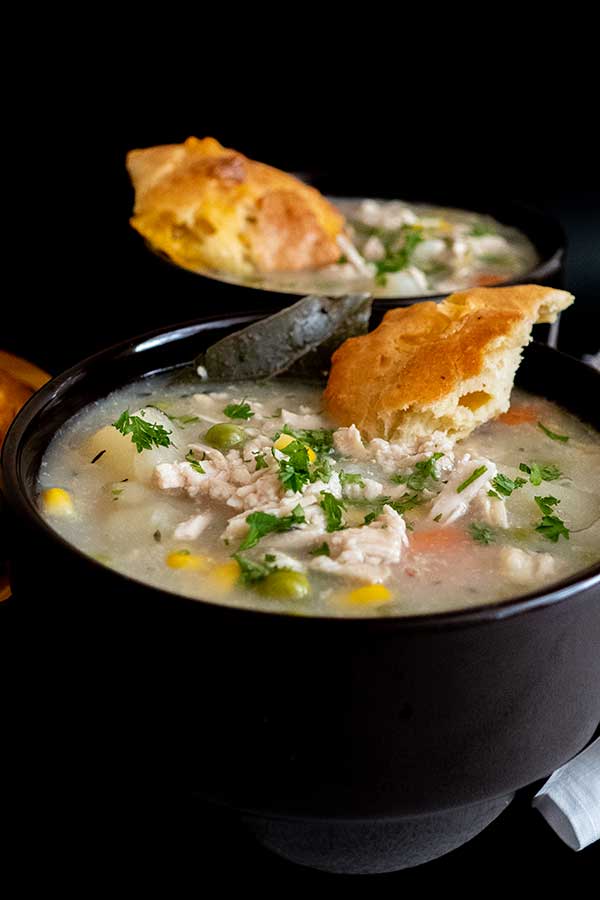 chicken pot pie soup with biscuits in 2 cups