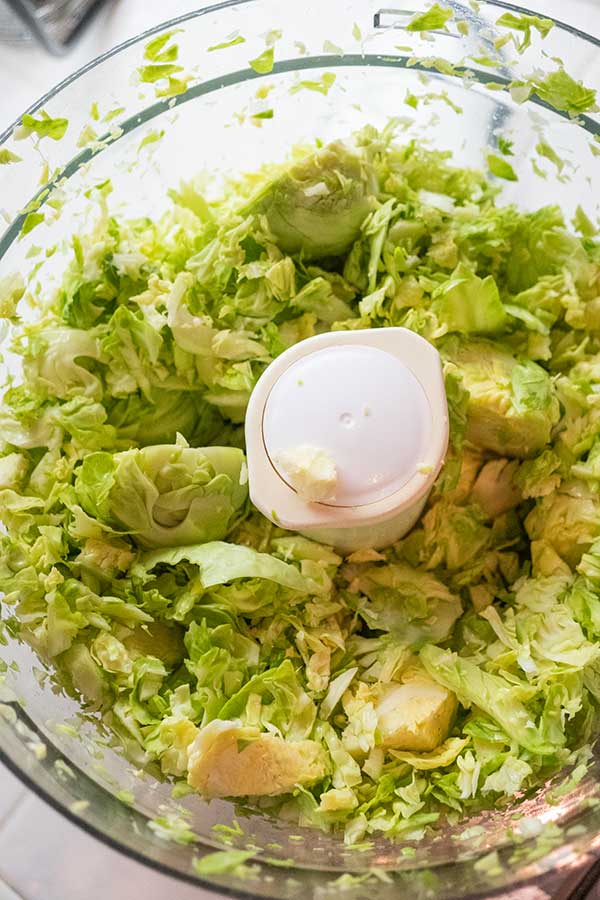 shredded brussel sprouts in a food processor