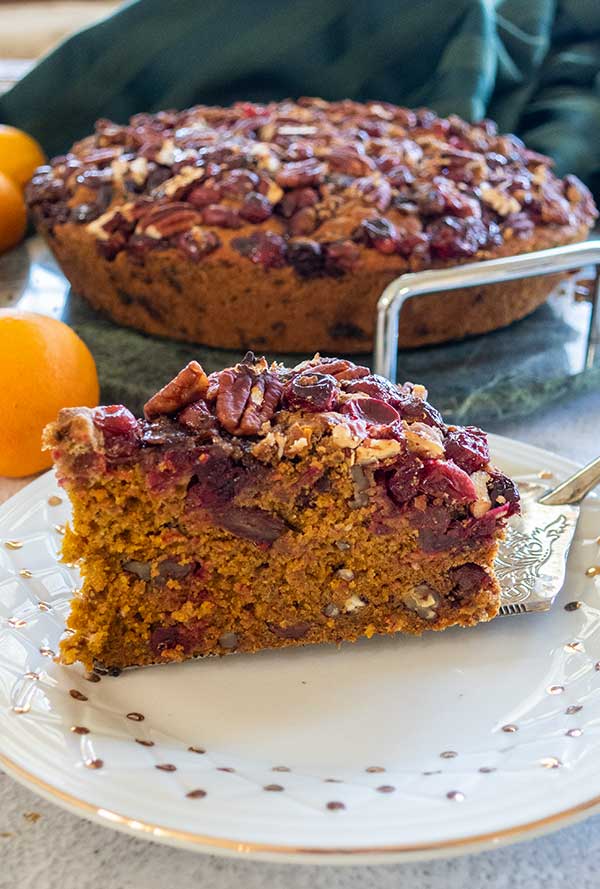 slice of gluten free christmas cake on a plate