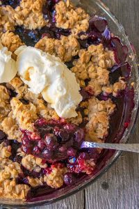 gluten free blueberry crumble topped with yogurt