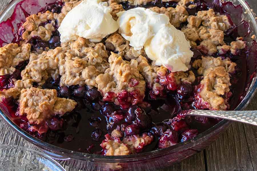 blueberry crumble topped with ice cream