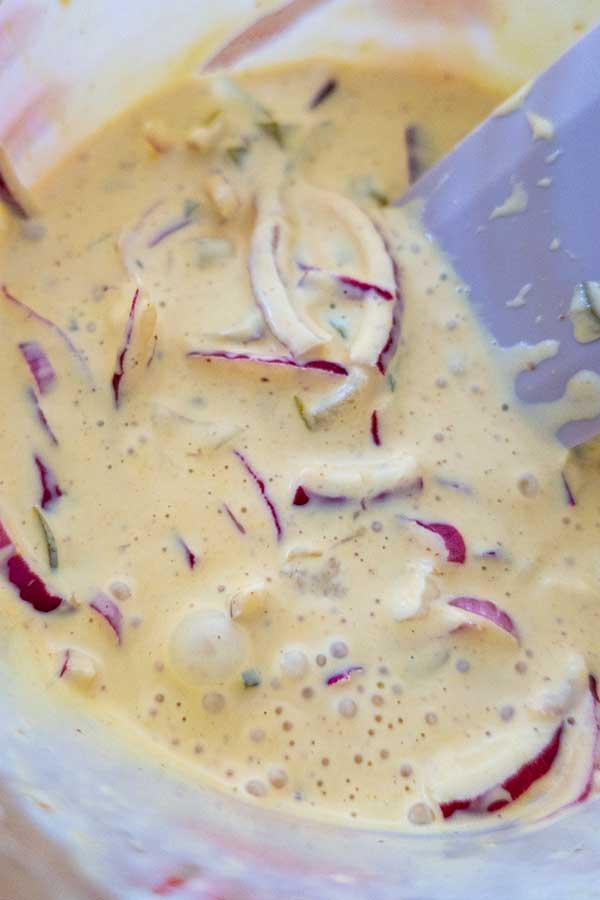 mayo-mustard salad dressing with red onions and pickles