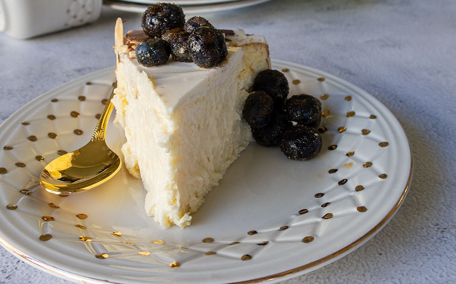 a slice of amarettto cheesecake on a plate