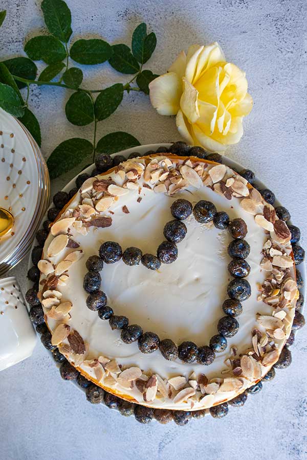 grain free cheesecake with heart made of blueberries