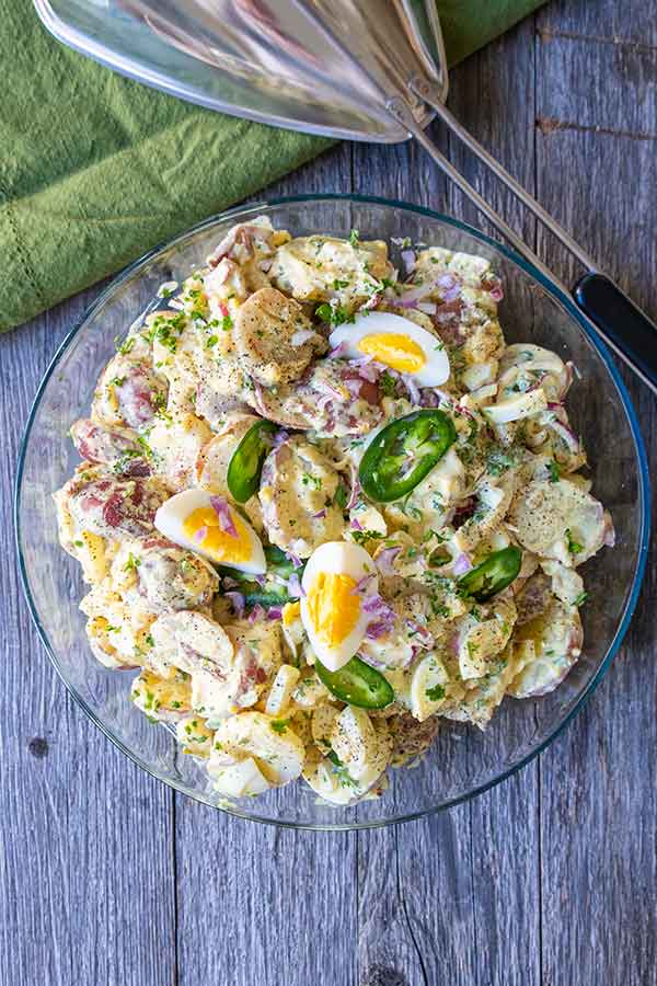potato salad with eggs and pickles in a bowl