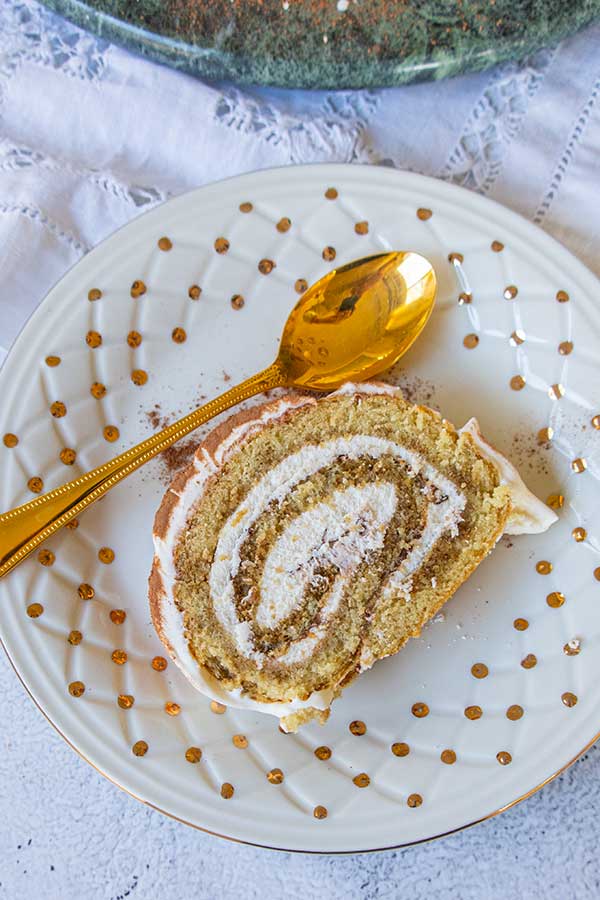 slice of tiramisu Swiss roll on a plate