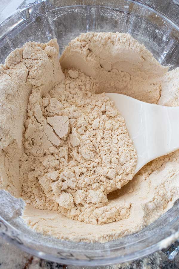 chickpea flour in a bowl with spatula