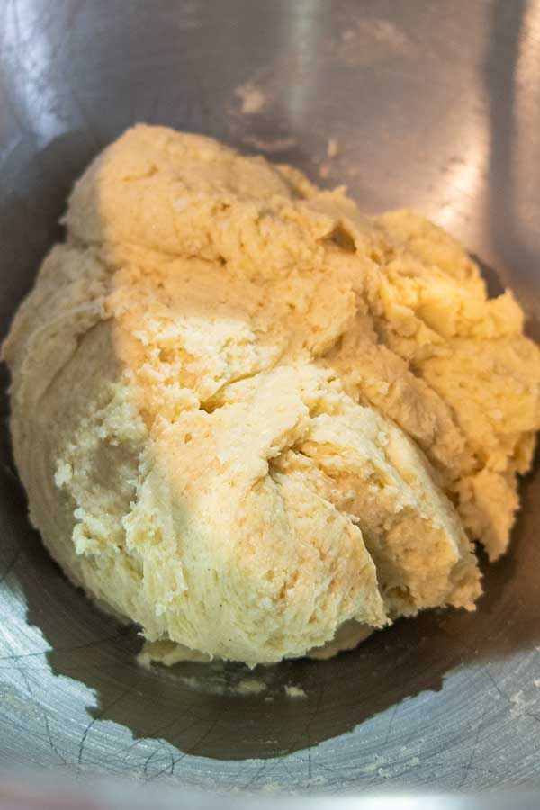 shaped crescent roll dough in a stand mixer bowl