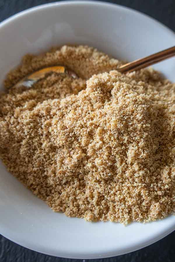 ground flaxseed in a bowl with a spoon