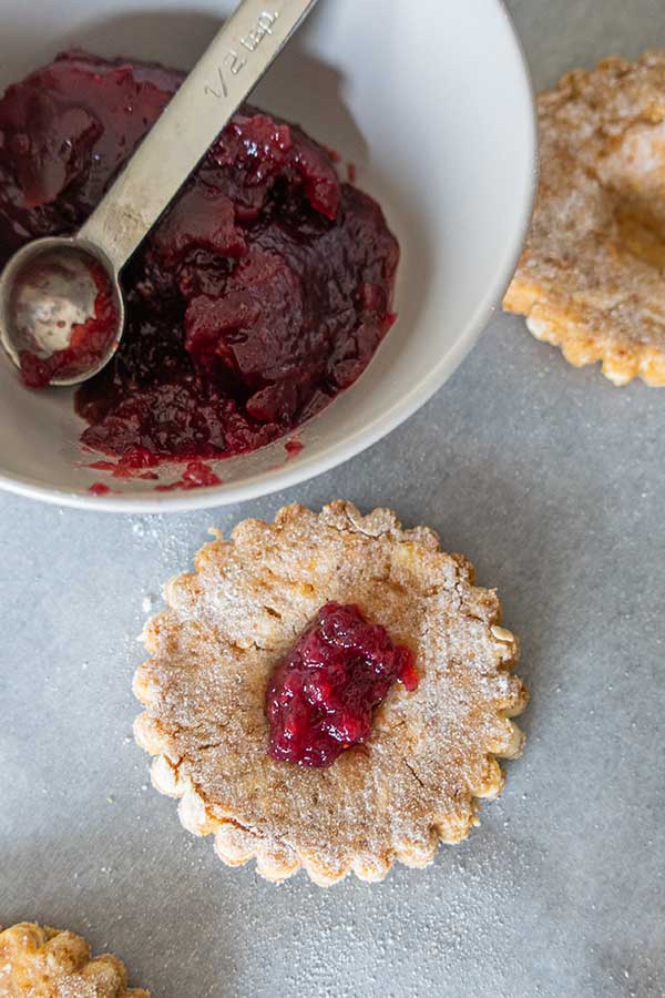 dollop of jam in a circle of scone dough