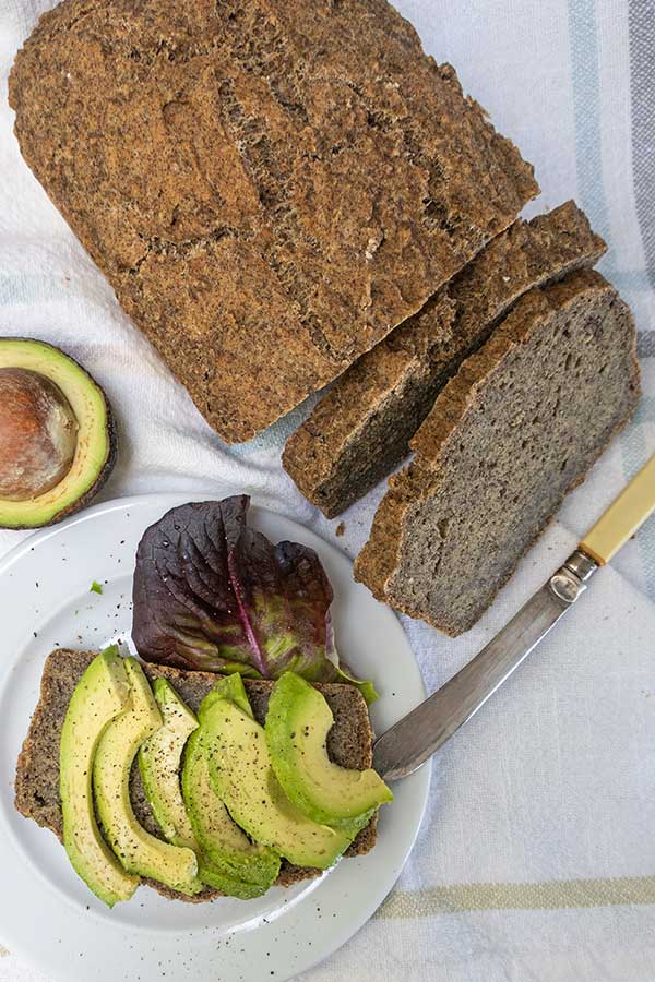 low allergen gluten free bread, sliced topped with avocado
