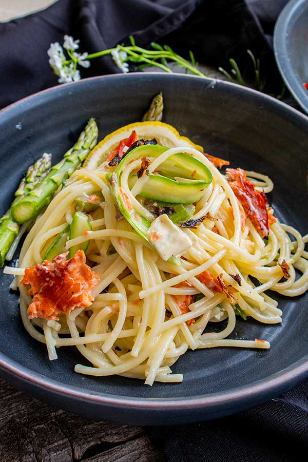 smoked salmon and asparagus pasta on a plate