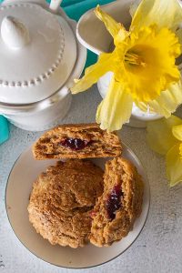 gluten free jam bellied flax scones on a plate