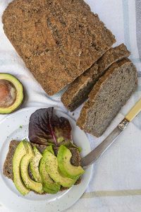 top view of loaf of low allergen bread and 2 slices
