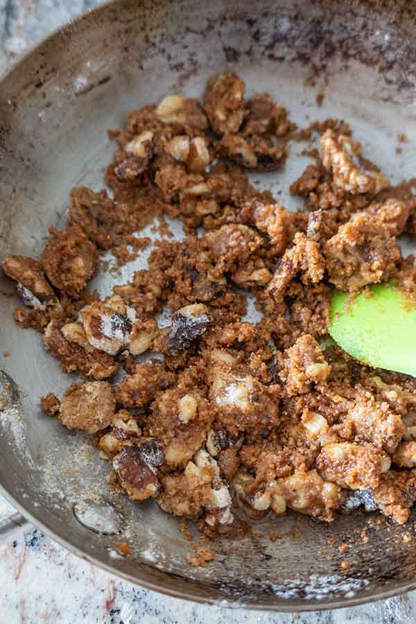 brown butter, flour, sugar and walnuts in a skillet