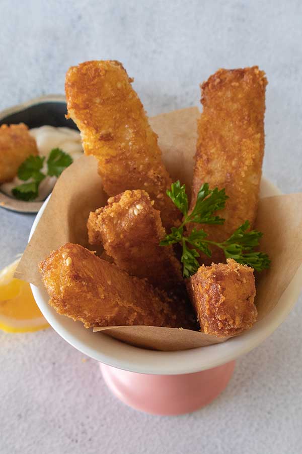 gluten free potato sticks in a pink bowl