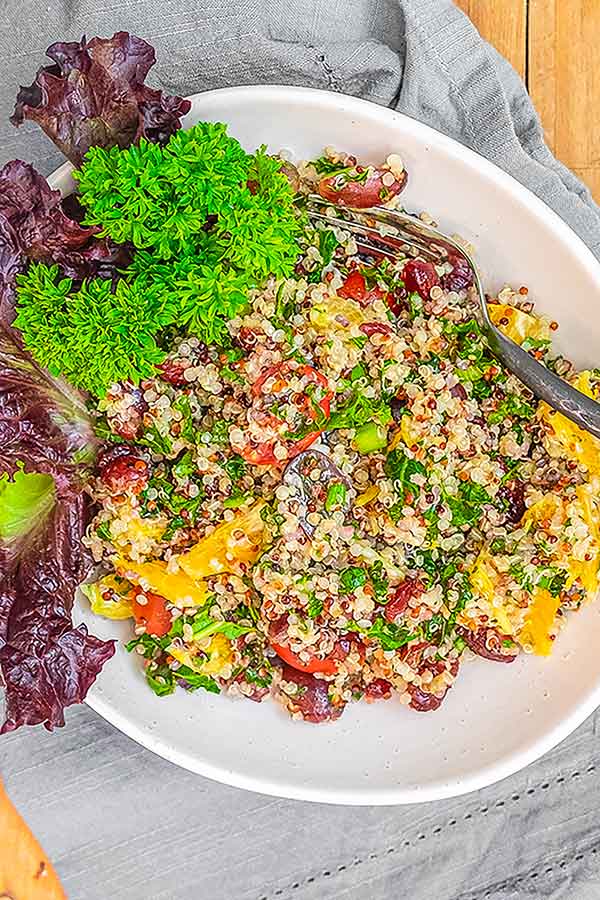 quinoa salad with fruit in a bowl, gluten free