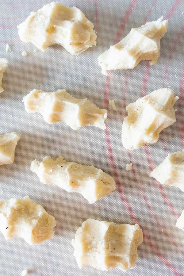 shaped pieces of gnocchi on a working surface