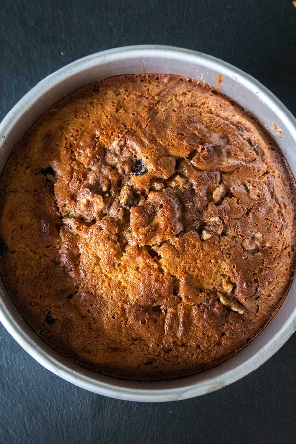 top view of gluten free baked blueberry cake in a pan