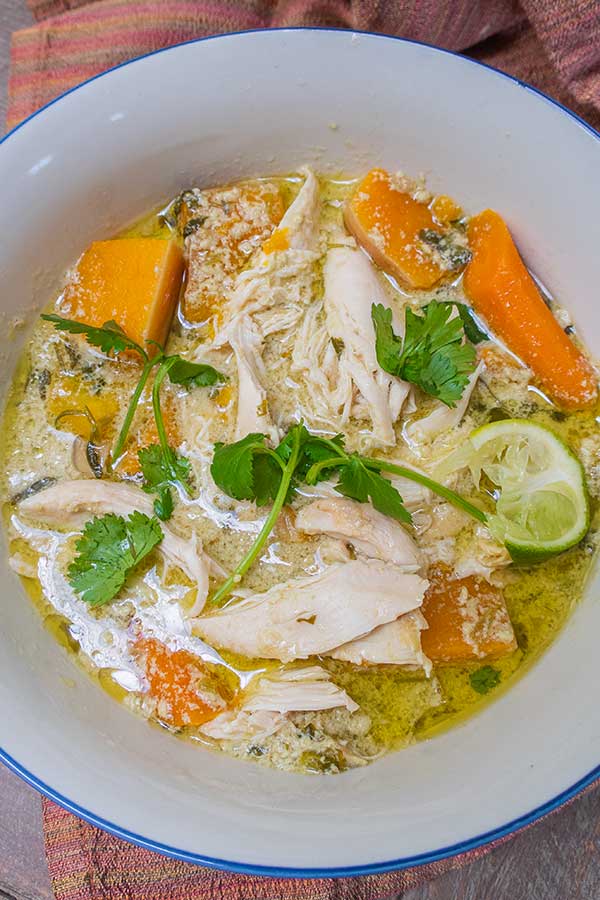 top view of thai chicken soup. in a bowl