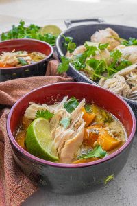 Thai green chicken soup in two bowls
