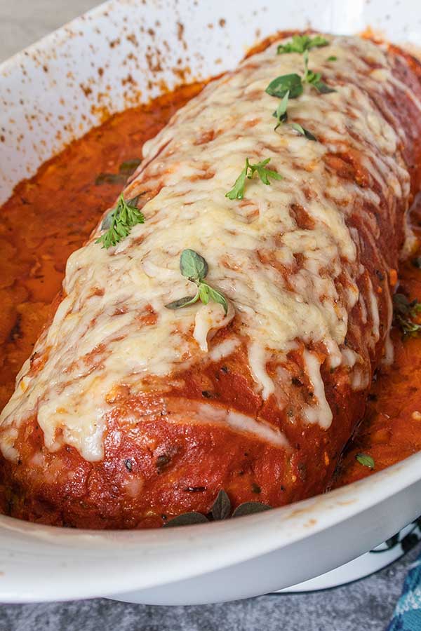 baked chicken meatloaf in a dish with tomato sauce