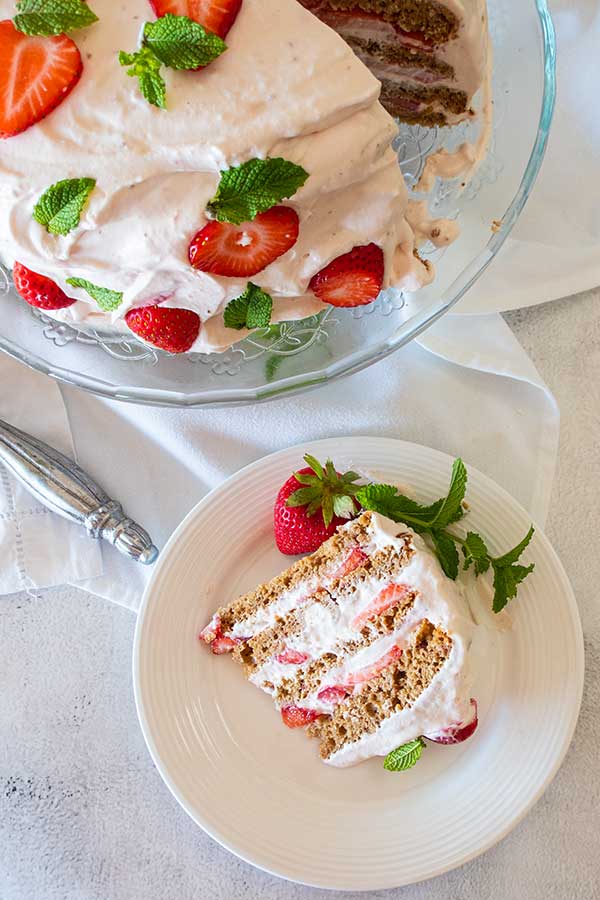 top view of a slice of strawberry icebox cake on a plate