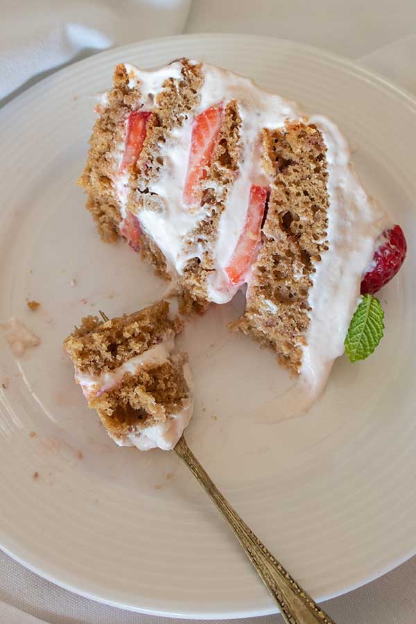 half eaten cake on a plate