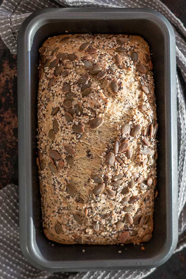 top view of baked gluten-free quick bread in a pan