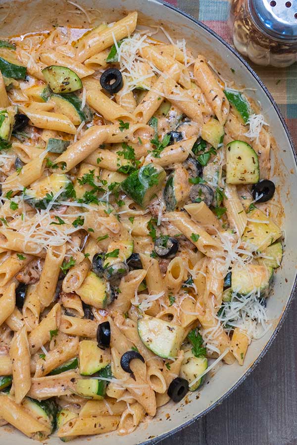 top view of tuscan zucchini pasta in a skillet