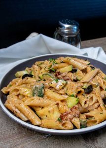 tuscan zucchini pasta on a plate, gluten free