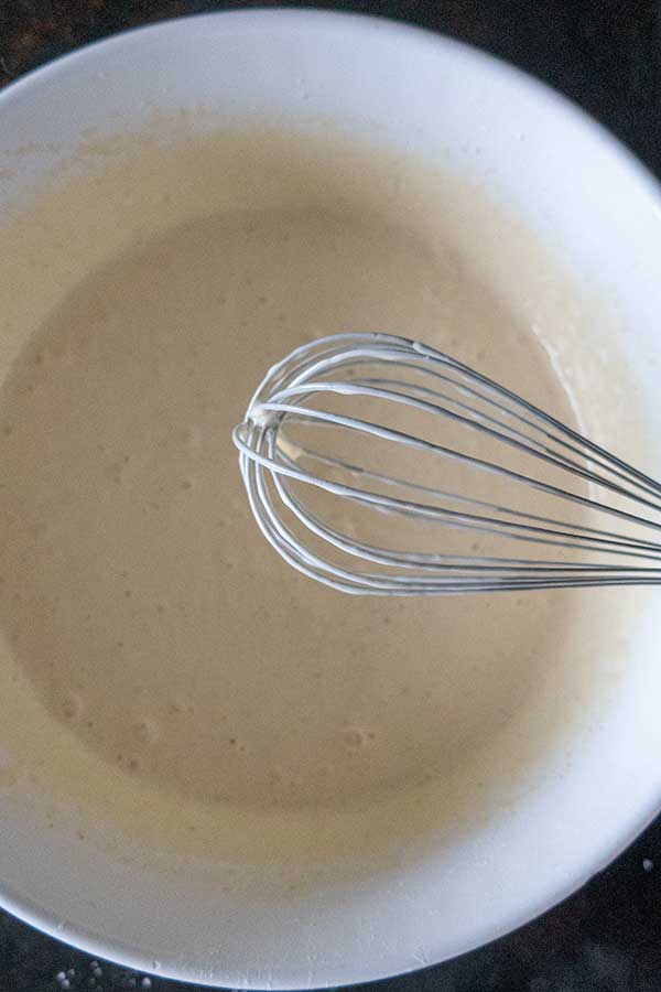 thin batter with a whisk