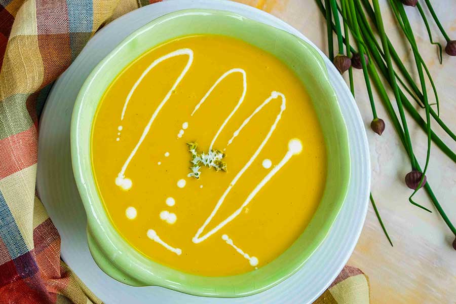 butternut squash apple fall soup in a bowl