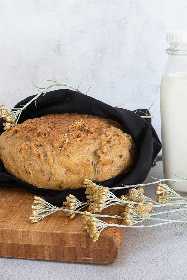 How to make dutch oven bread when camping - One Mighty Family