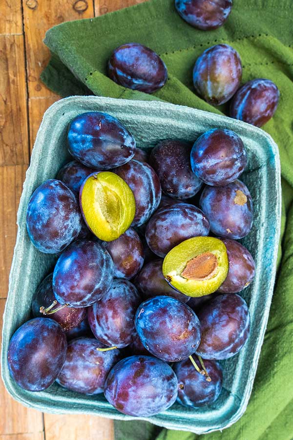 fresh plums in a basket