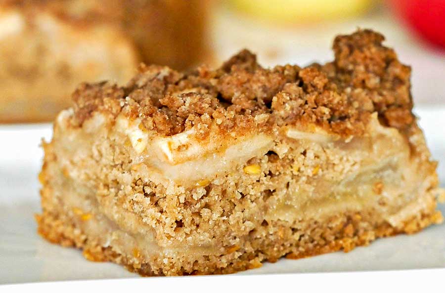slice of vegan apple streusel cake on a plate, dairy and gluten free