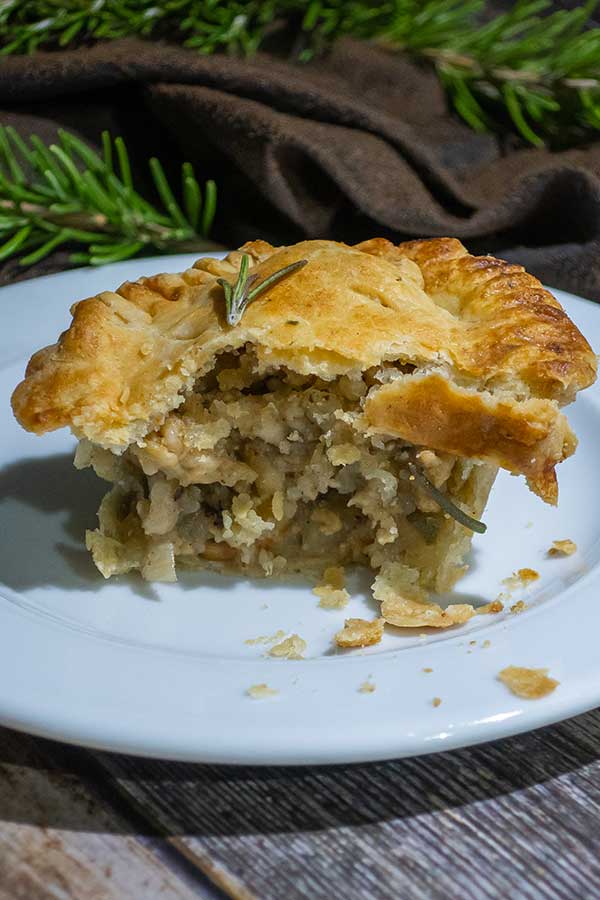 cross view of a tourtiere on a small plate